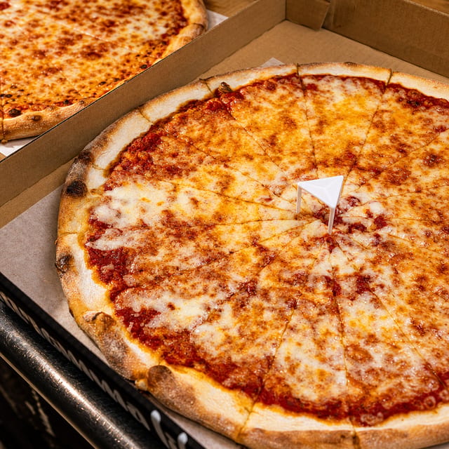 Quattro Formaggio Whole Pie.